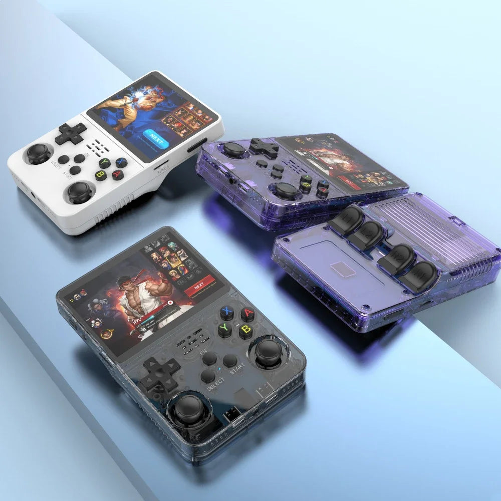 Four handheld gaming consoles on a light blue background