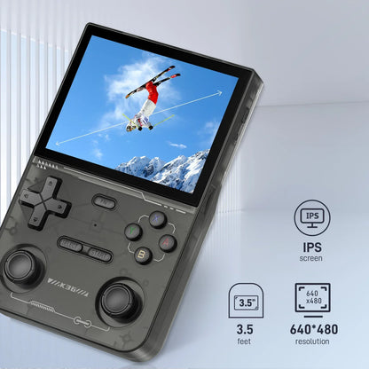Handheld gaming console with IPS screen displaying a game, on a light gray background.