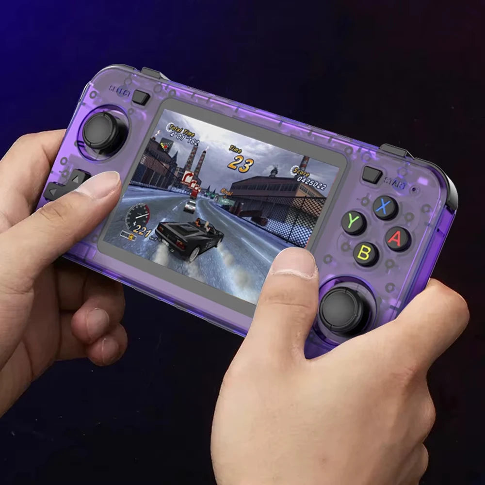Hand holding a purple gaming device with a racing game on screen against a dark background